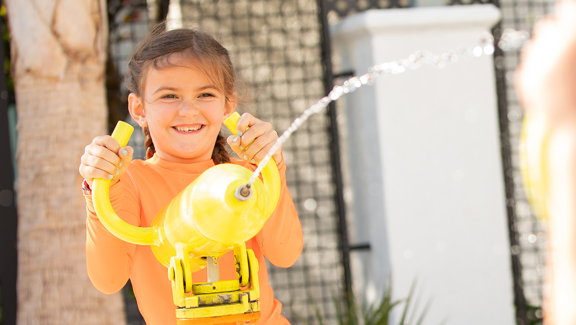 Girl spraying water