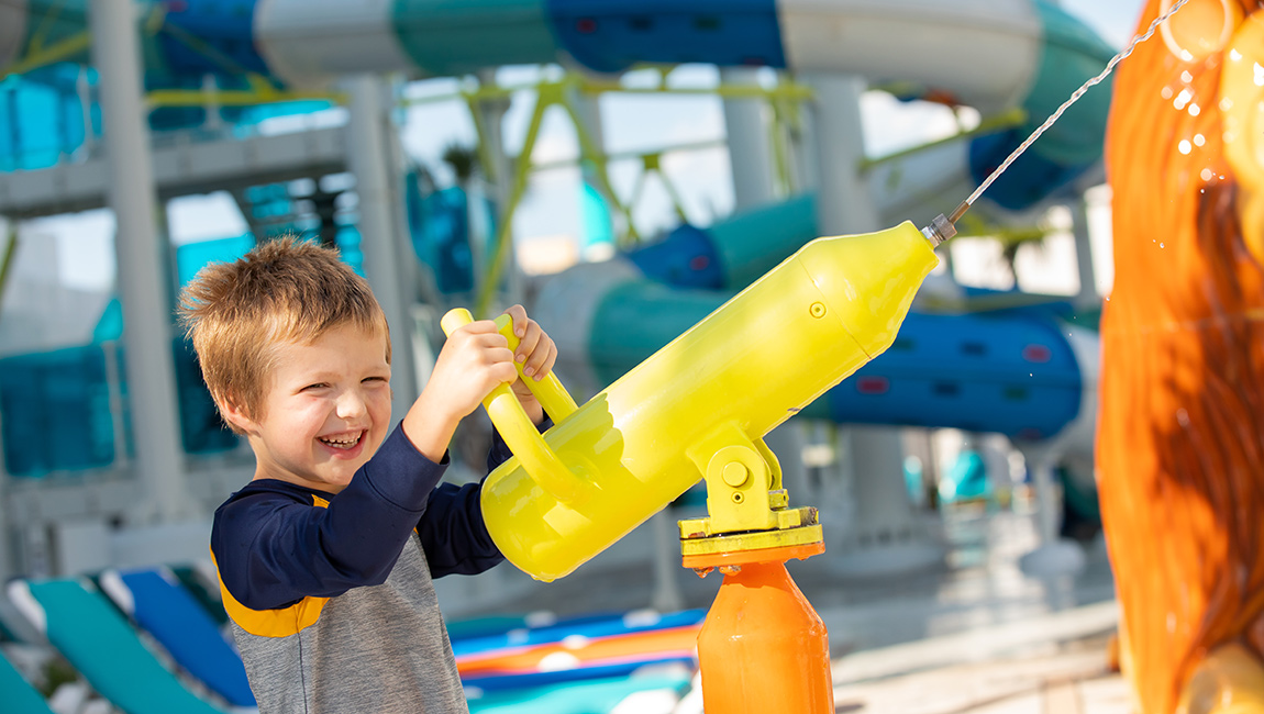 Boy spraying water