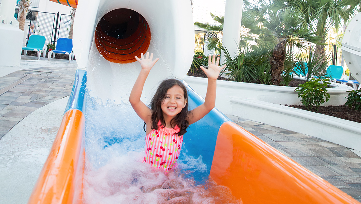 Girl coming out of slide