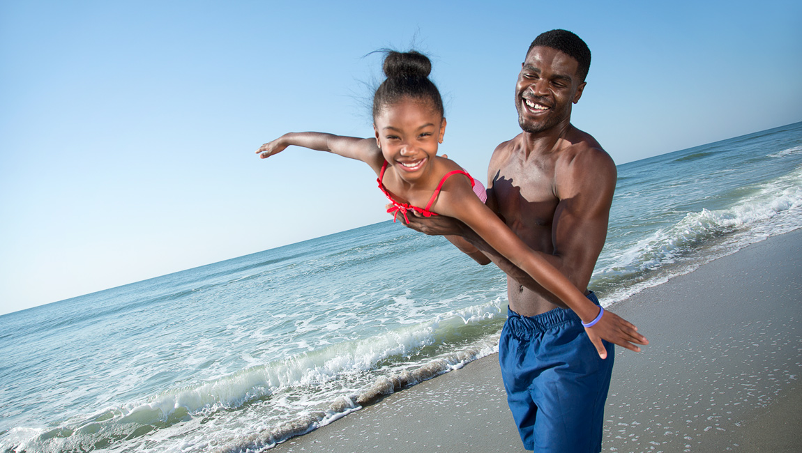 Father and Daughter on the Beach